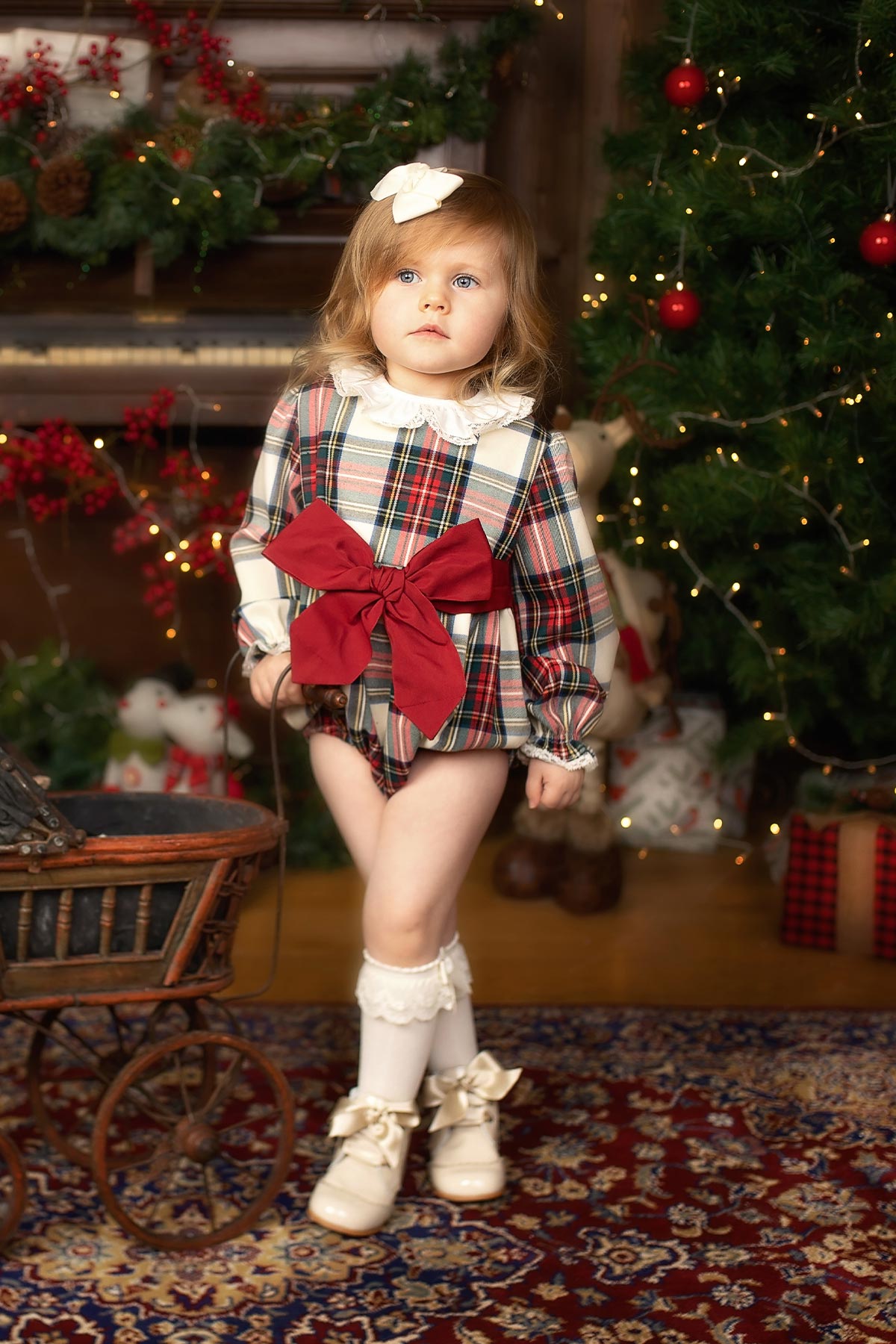 girl wearing tartan girls romper