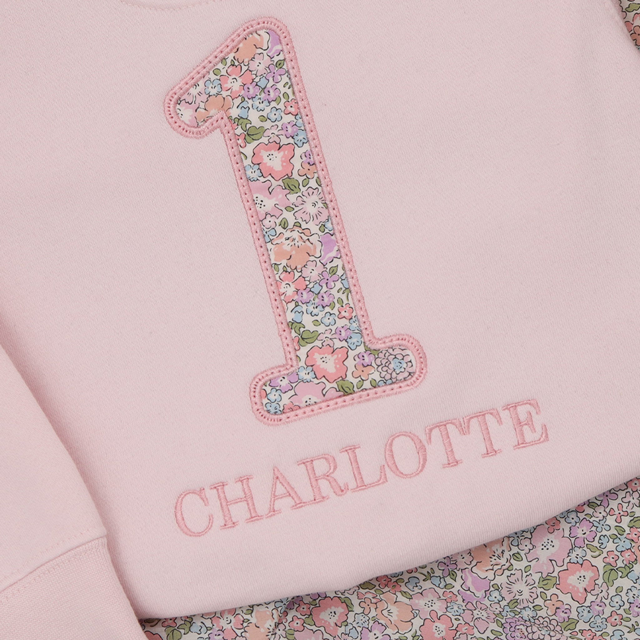 Personalised Liberty First Birthday Jumper – Name Below Number