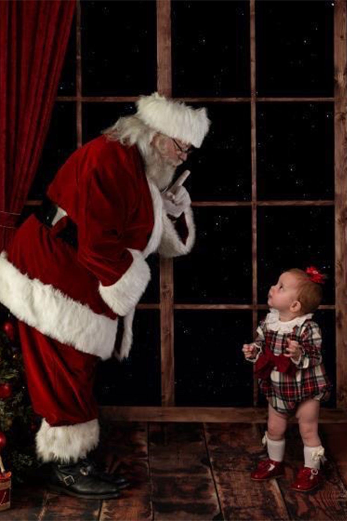 baby girl wearing classic tartan romper