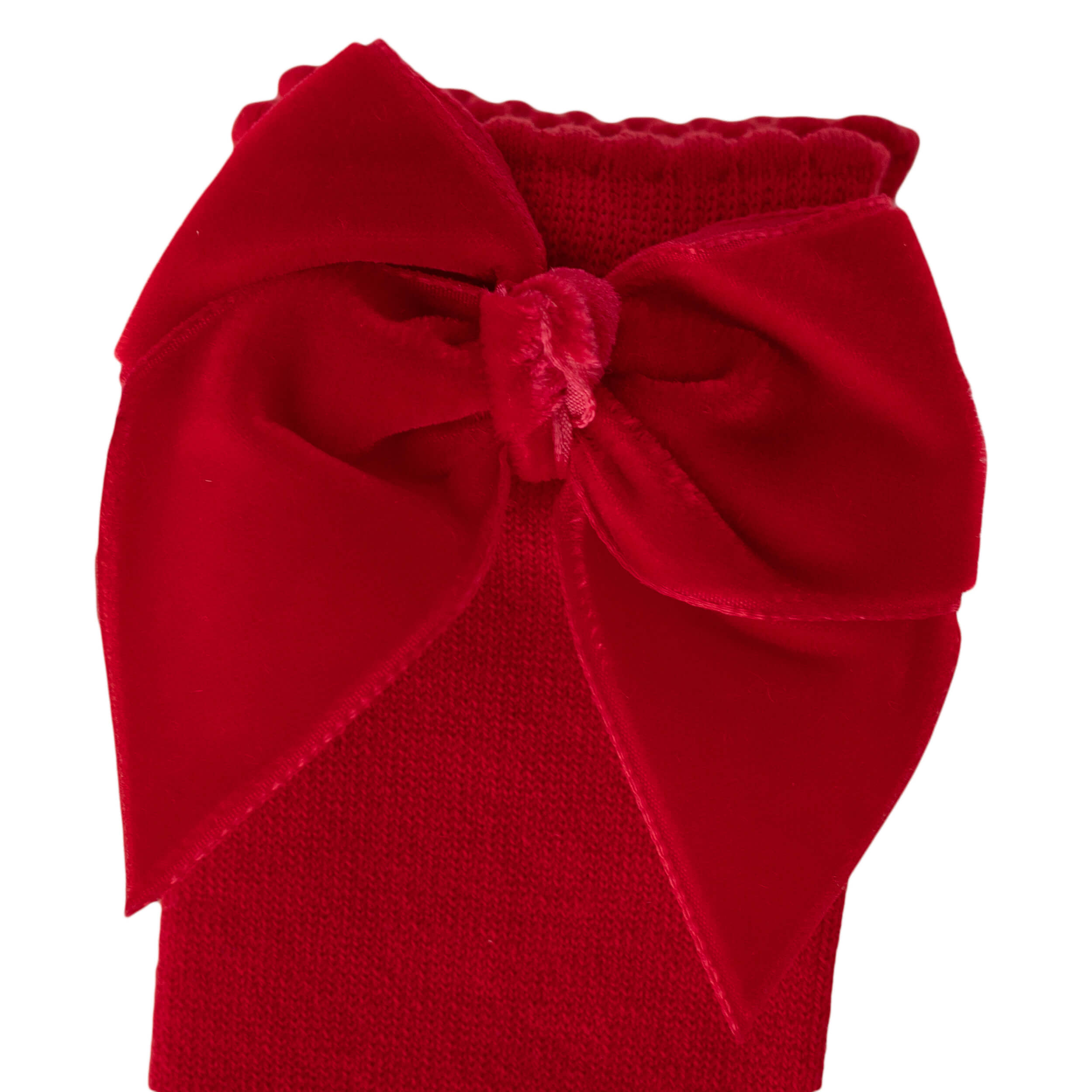 close up red velvet bow spanish baby socks