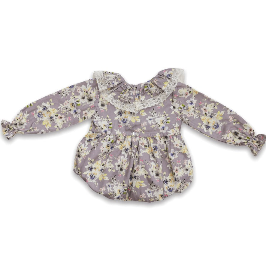 back of lilac baby girl romper