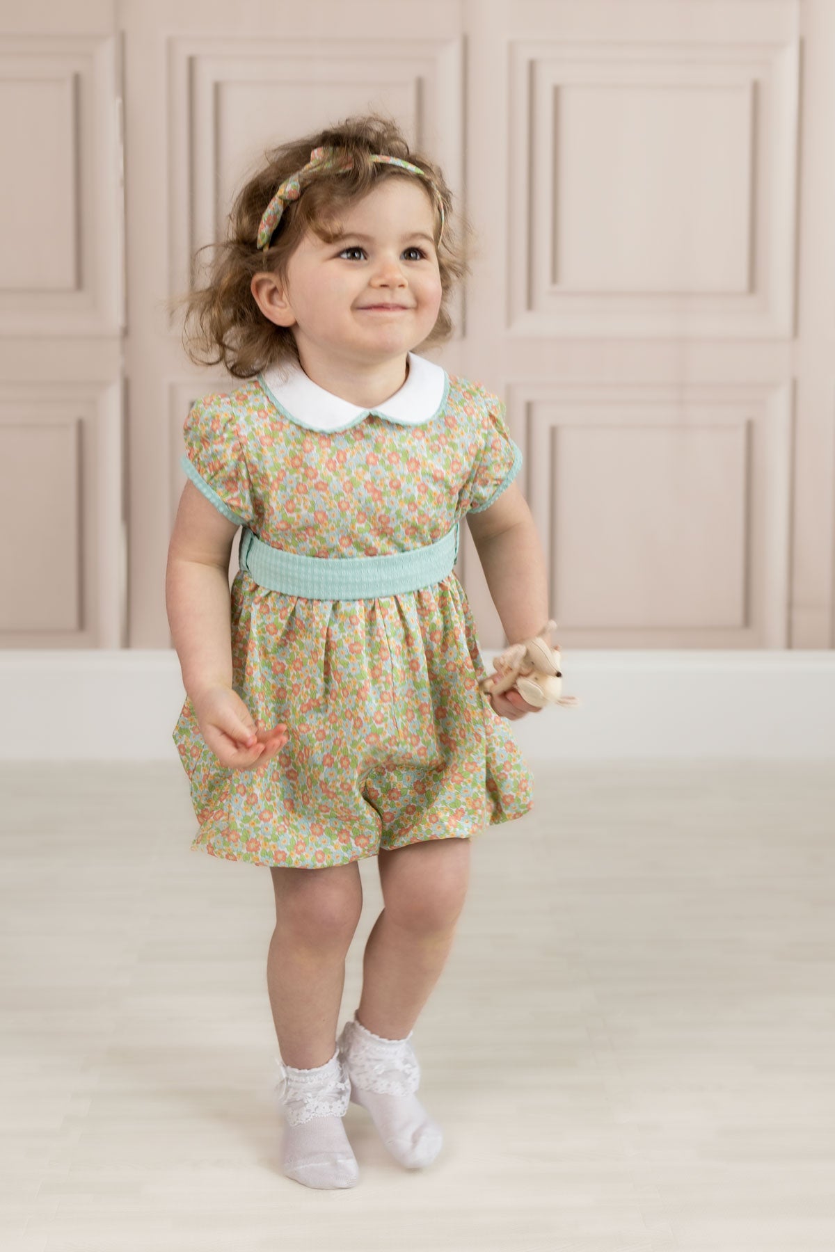 girl wearing traditional girls romper