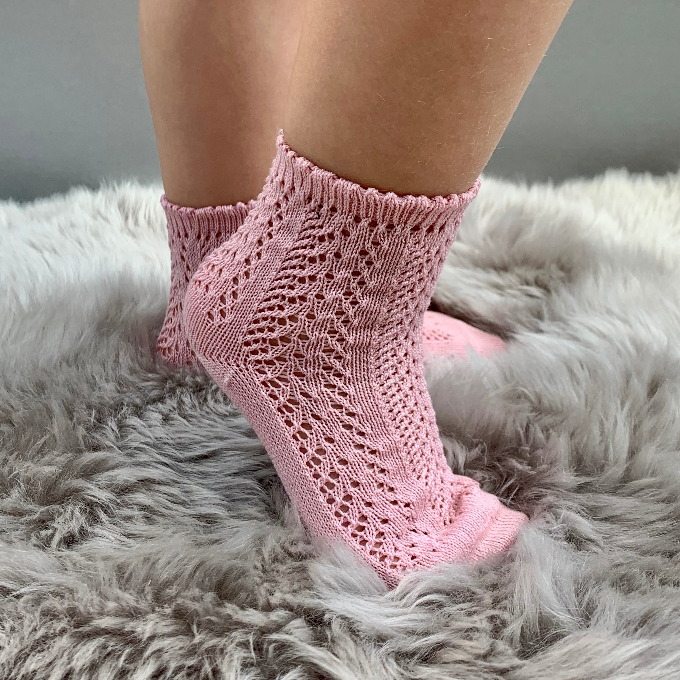 girl wearing perle openwork antique rose pink ankle socks, made in spain