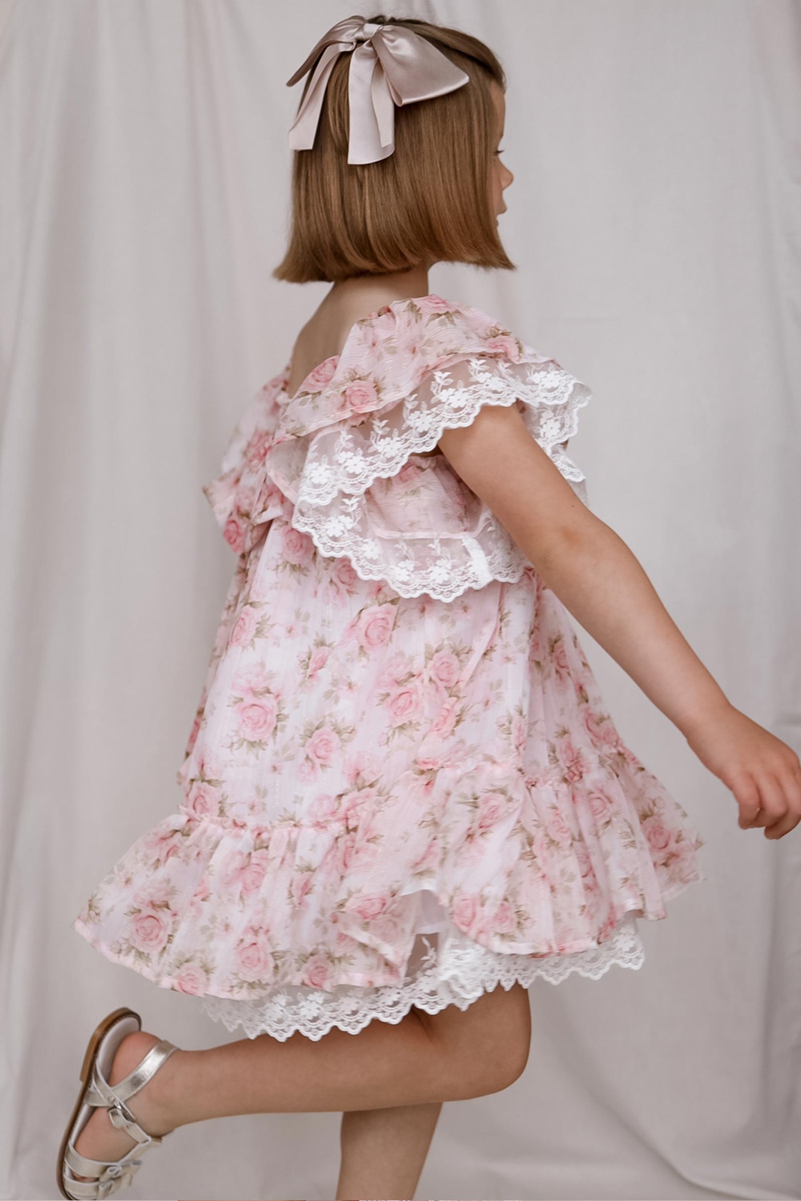 girl wearing floral chiffon dress