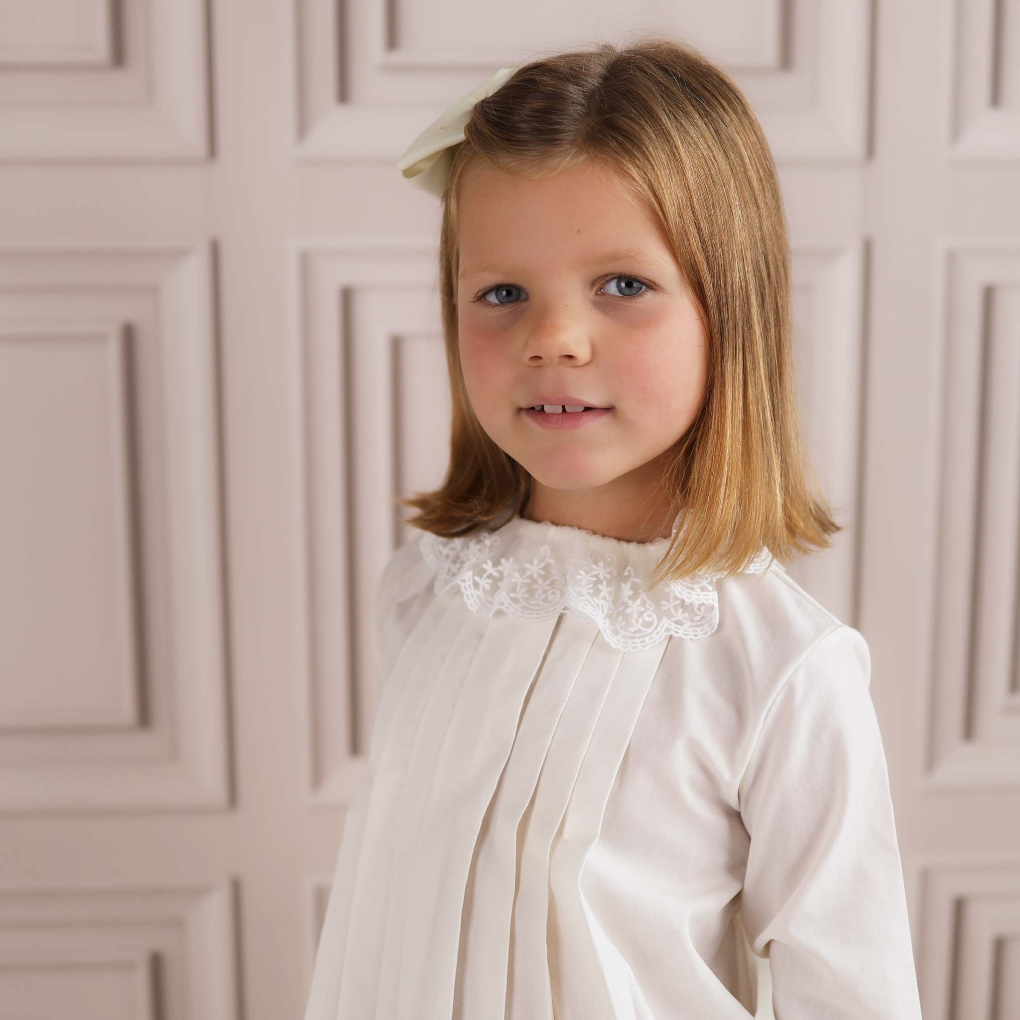girl wearing ivory lace collar girls blouse