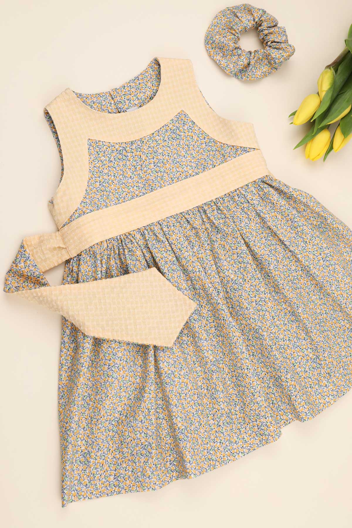 girls lemon dress flatlay