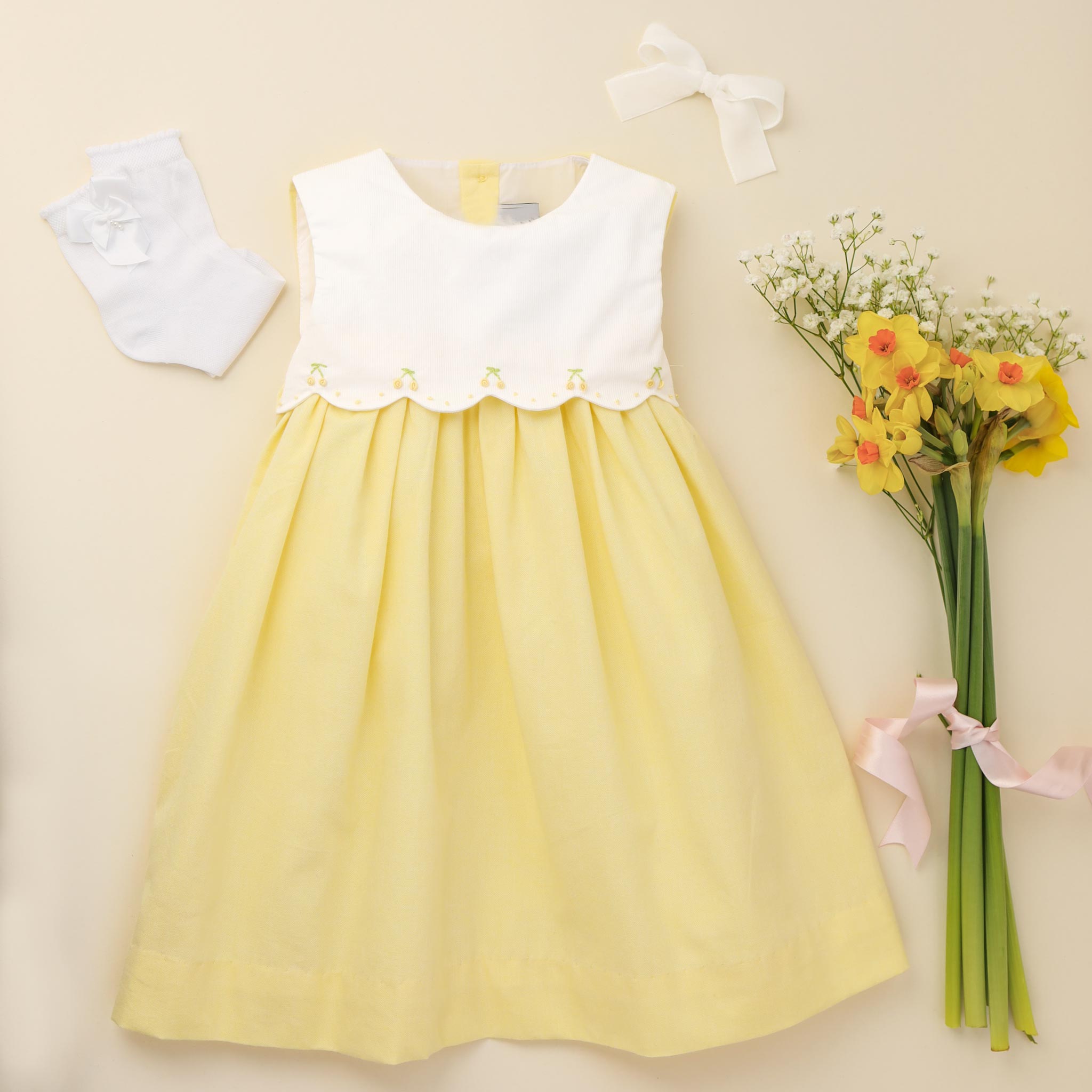 girls embroidered dress flatlay
