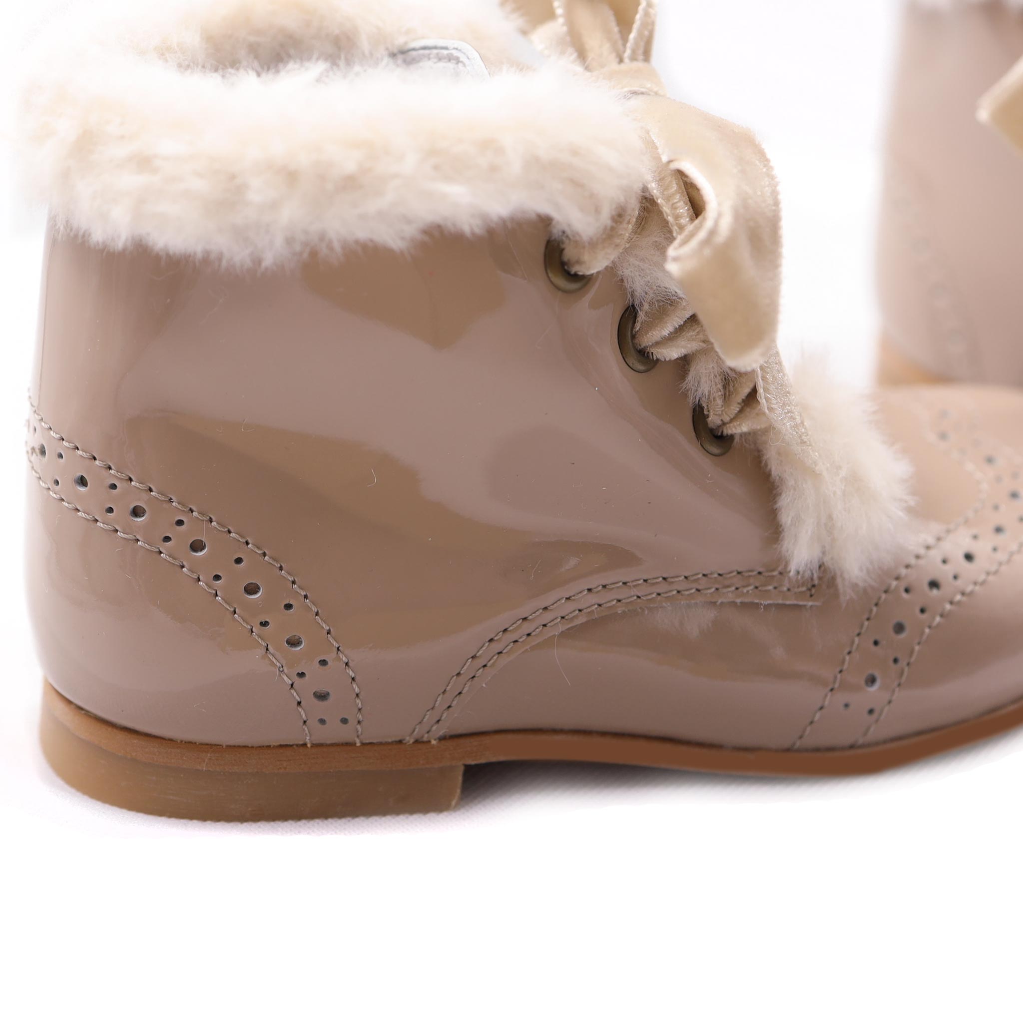girls faux fur lined patent leather boots