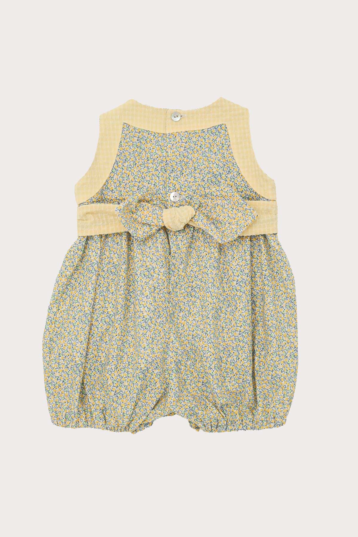 back of lemon ditsy print baby girl romper