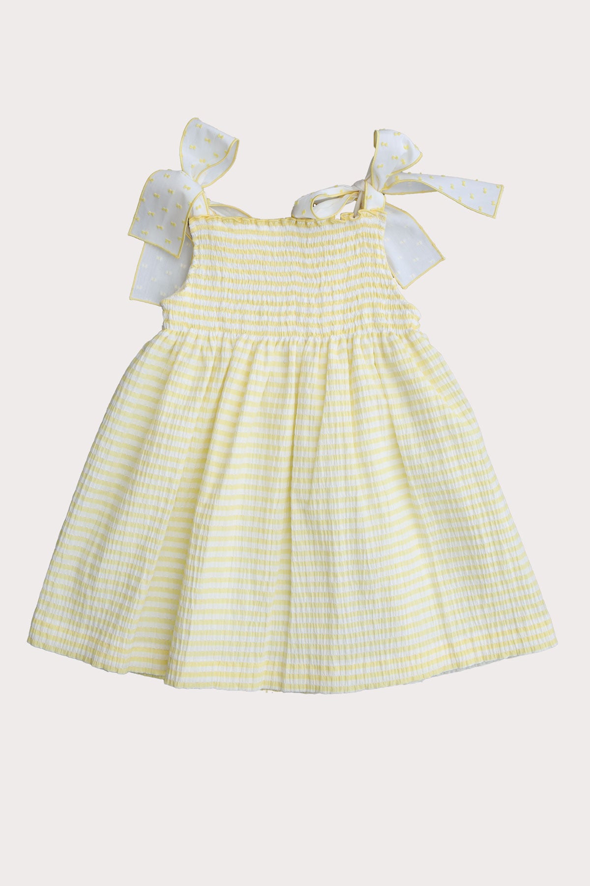 back of girls lemon striped summer dress