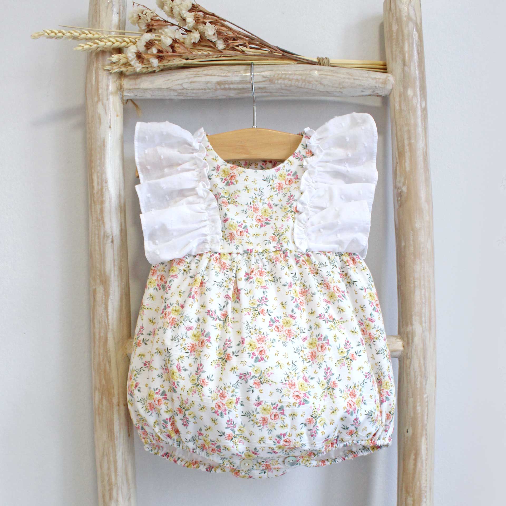 pukatuka floral baby romper with plumeti frill